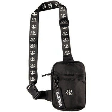 Black sling bag with a patterned strap on a white background