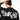 Person wearing a black tshirt with 'SUBLABEL' text on the back, against a white background
