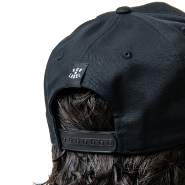 Black cap on a white background