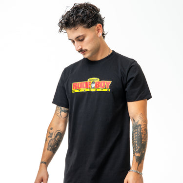 Man wearing a black t-shirt with a colorful graphic design on a white background
