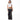 Woman wearing a white crop top with text and black wide-leg jeans on a white background