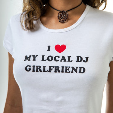 White t-shirt with 'I ❤️ MY LOCAL DJ GIRLFRIEND' text and red heart symbol.