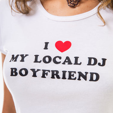 White t-shirt with 'I ❤️ MY LOCAL DJ BOYFRIEND' text on a person wearing it.