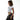 Woman wearing a white t-shirt with text and dark jeans on a white background