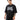 Person wearing a black t-shirt with white text on a white background