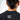Person wearing a black t-shirt with 'SUB LABEL' logo on the back against a white background