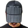 Person wearing a black cap with text 'Around the world, Daft Punk 1997' on a white background