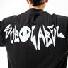 Black tshirt with white 'Sublabel' branding on a plain background
