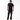 Person wearing a black t-shirt with a logo on the back, standing against a white background