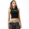 Woman wearing a black sleeveless top with text and gray pants on a white background