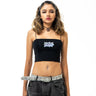 Woman wearing a black crop top with a brand logo and gray pants on a white background