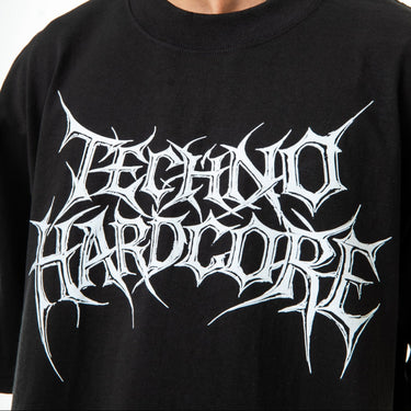 Black t-shirt with white 'Techno Hardcore' graphic design on a plain background