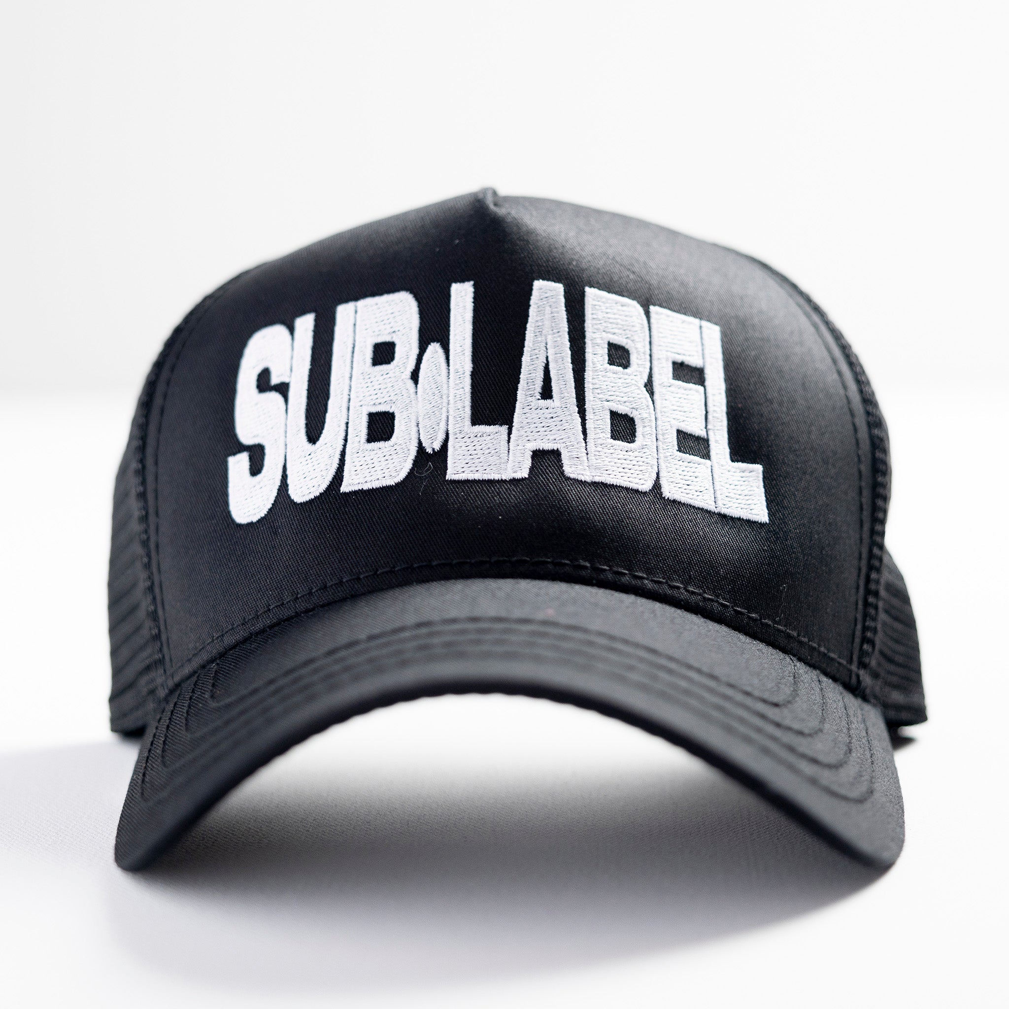 white sub•label • 5-panel trucker hat