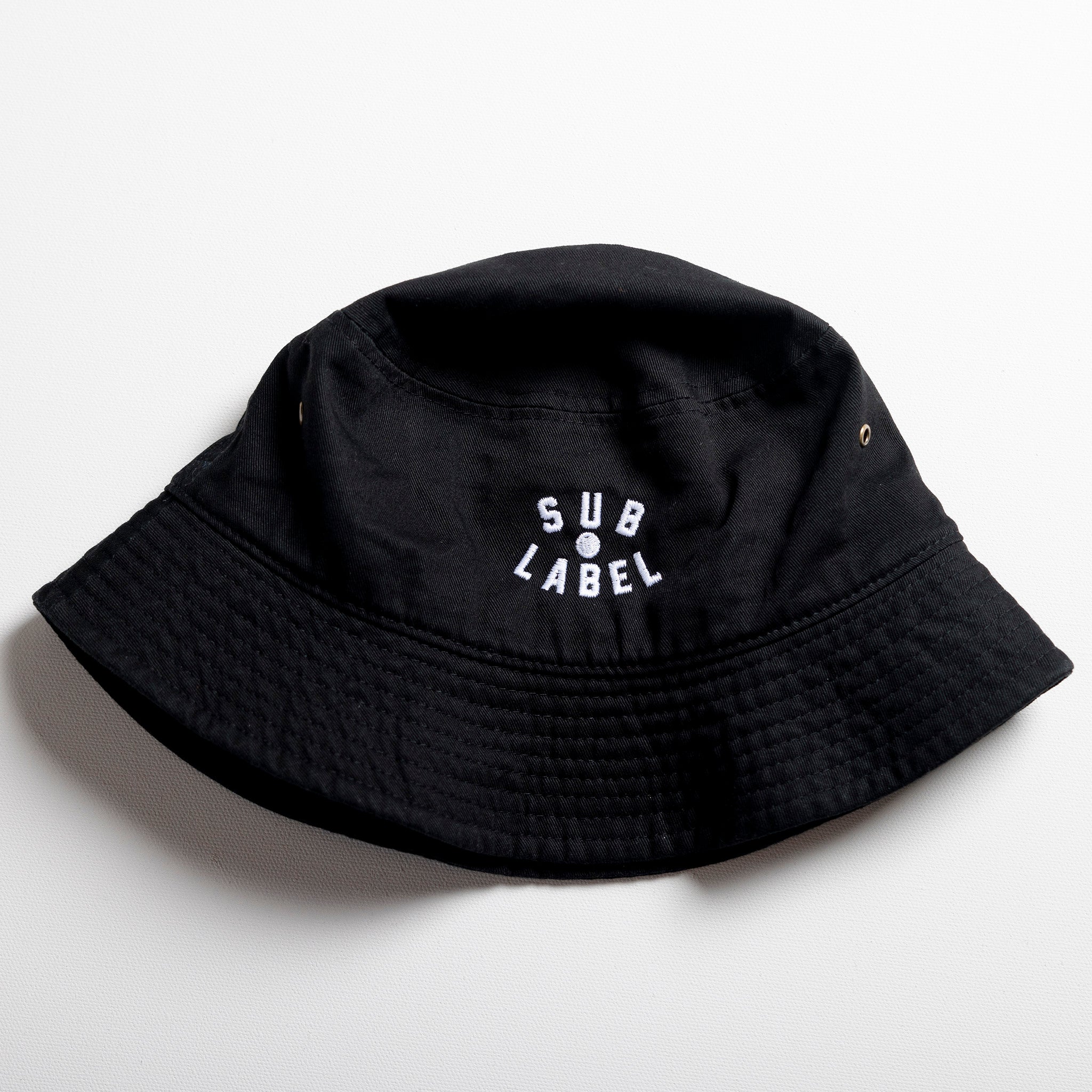 pupil (white) • bucket hat