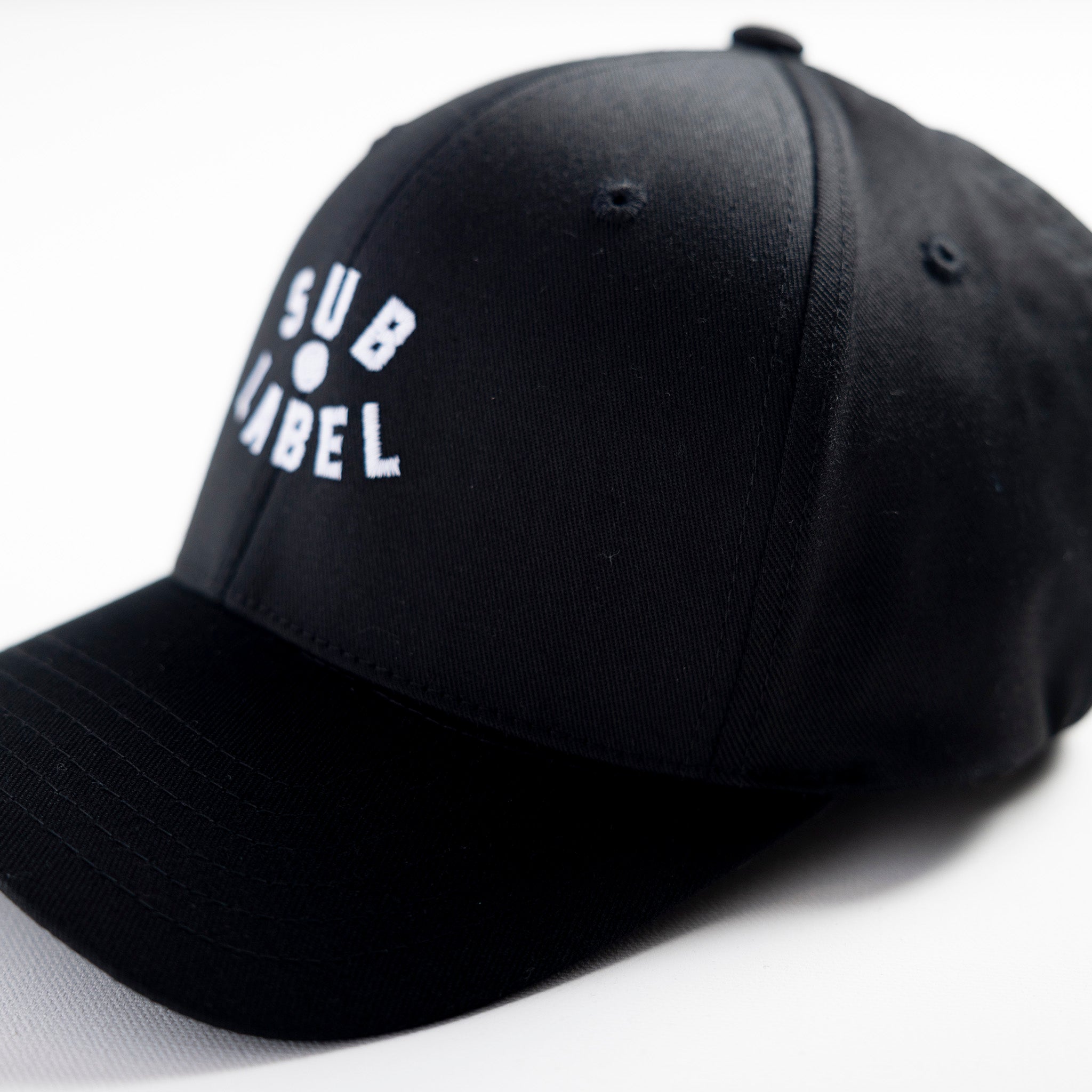 pupil (white) • flex fitted cap