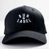 A black flex fitted cap with the text 'SUB LABEL' embroidered in white on the front.