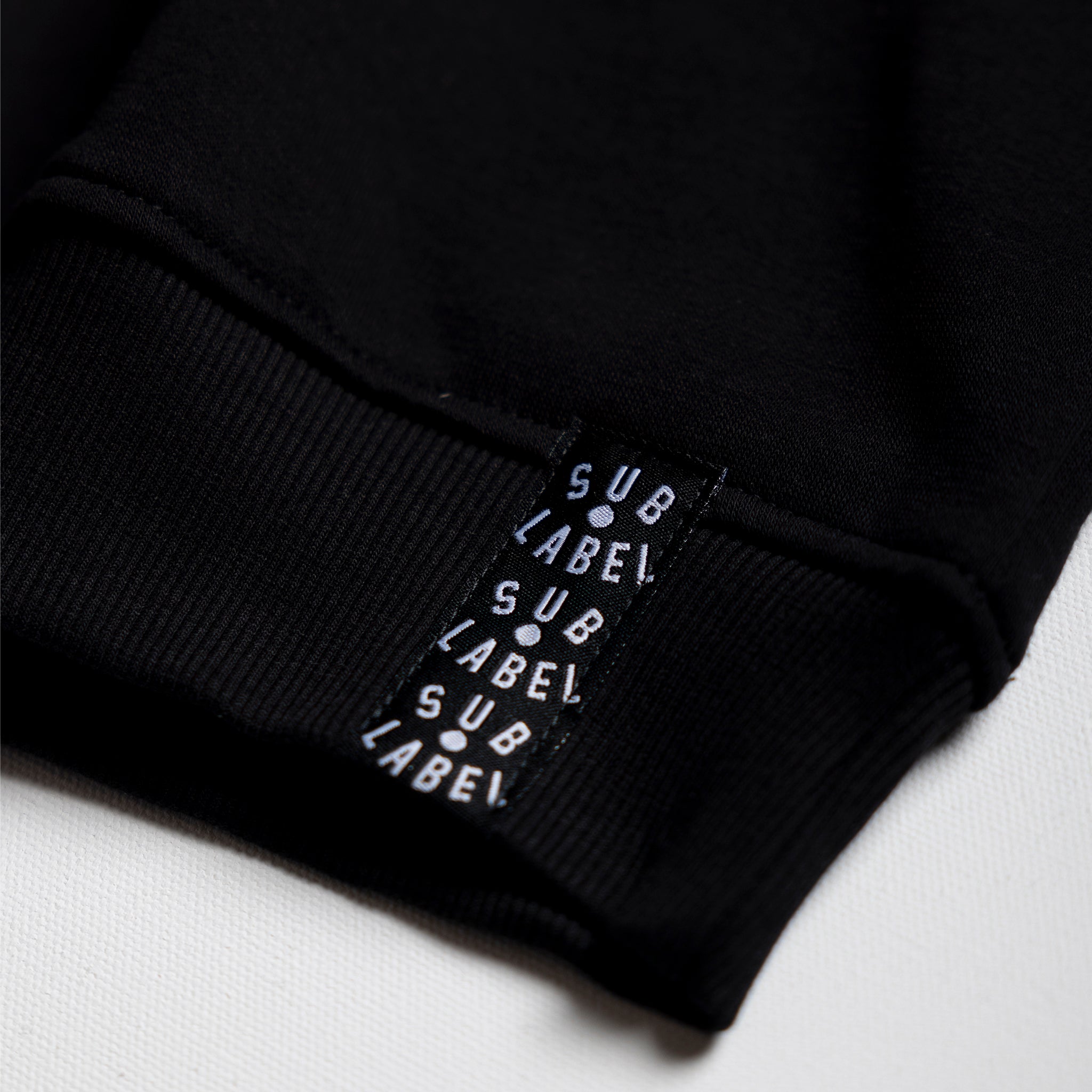 sub•label text (white) • hoodie
